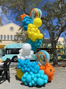 a bunch of balloons that are on the ground