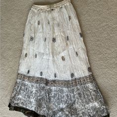 Never Worn Brand New White Long Skirt With Beautiful Black And Gold Patterns. White Long Skirt, Skirt With Elastic Waistband, Gold Pattern, Black And Gold, Long Skirt, White Cotton, Womens Skirt, Color White, A Line