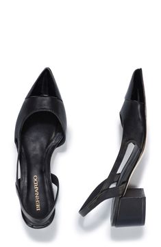 A pointy cap toe and half d'Orsay silhouette bring visual intrigue to a slingback leather pump set on a cushioned footbed and wrapped block heel. 1 3/4" heel Elasticized slingback strap Cushioned footbed Leather upper, lining and sole Made in Brazil Black Slingback Pumps With Deep Heel Cup, Black Leather Slingback Pumps With Deep Heel Cup, Black Slingback Pumps With Leather Sole For Office, Black Low Heel Slingback Pumps With Branded Heel, Black Slingback Pumps With Leather Sole, Evening Leather Slingback Pumps With Rubber Heel Cap, Black Leather Slingback Pumps With Sculpted Heel, Black Slingback Pumps With Ankle Strap And Leather Sole, Classic Black Slingback Pumps With Open Heel