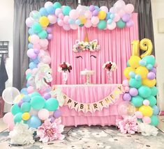 a birthday party with balloons and decorations