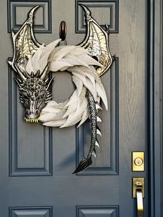 a door with a dragon wreath on it