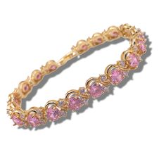 Add a pop of colour and elegance to your jewellery collection with this Yellow Gold Pink Tourmaline & Round Cut Created Diamond Twisted Bracelet. Featuring a stunning round-cut pink tourmaline, complemented by sparkling created diamonds, this bracelet is designed in a unique twisted pattern, giving it a modern yet timeless look. The warm yellow gold beautifully highlights the vibrant pink hue of the tourmaline, making it the perfect accessory for both casual and formal occasions. This bracelet m Bracelet Elegant, Twisted Bracelet, Warm Yellow, Wedding Jewelry Bracelets, Jewelry For Her, Wedding Bracelet, Pink Tourmaline, Bracelet Making, Round Cut