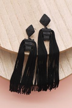 These boho earrings are made of high quality thread is a must-have jewelry item for your wardrobe!DIMENSION length:width: earring back: Postmetal finish: Gold Platingproduct: Lead & Nickel Compliantanti-tarnish: Double E-coating Black Tassel Drop Earrings, Trendy Black Dangle Beaded Earrings, Black Fringe Dangle Jewelry, Black Dangle Jewelry With Fringe, Black Bohemian Tassel Earrings For Party, Black Dangle Tassel Jewelry, Black Dangle Jewelry With Tassels, Trendy Black Fringe Jewelry, Black Fringe Tassel Drop Earrings