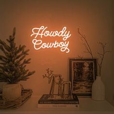 there is a neon sign that says, hodgy courcy on the wall