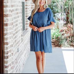 Umgee Blue Henley Babydoll Dress Functional Buttons Has Stretch Small Fits Up To A Size 6 Length 35” Casual Solid Blue Dress, Blue Short Sleeve Solid Color Dress, Blue Solid Color Dress For Brunch, Cute Blue Short Sleeve Mini Dress, Cute Blue Mini Dress For Daywear, Blue Short Sleeve Dress For Daywear, Cute Blue Flowy Dress, Blue Flowy Mini Dress With Short Sleeves, Blue Flowy Mini Dress For Daywear