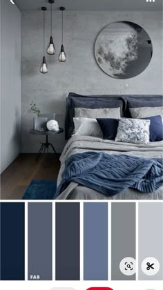 a bedroom with gray walls and blue bedding