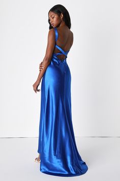 The Lulus Perfectly Classy Royal Blue Satin Strappy Maxi Dress brings the perfect amount of sexy meets chic! Fall in love with this sleek woven satin dress that features a V-neckline and wide straps that flow into a strappy back. A darted bodice carries into a figure-skimming silhouette that ends at a maxi length hem with a small train at the back. Hidden back zipper/clasp. Fit: This garment fits true to size. Length: Floor length. Size medium measures 66" from shoulder to hem. Bust: Great for a Blue Satin Dress, Prom Dress Inspo, Strappy Maxi Dress, Blue Dress Formal, Sophia Bush, Formal Dresses Gowns, Prom Dress Inspiration, Cute Prom Dresses