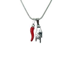 "Includes the two lucky Italian protection charms and necklace chain in black velvet jewelry bag. -- MEASUREMENTS -- The MANO CORNUTO charm size is about .787\" tall x .275\" across x .128\" thick (20mm x 7mm x 3.25mm) The RED CORNICELLO charm size is about .709\" tall x .177\" wide x .108\" thick (18mm x 4.5mm x 2.75mm) The necklace chain is offered in your choice of length from 16\" to 30\" (40cm to 76cm) --MATERIALS-- Made in USA from Waterproof and Hypo-Allergenic Stainless Steel with Enamel coating on the horn charm. --ABOUT-- This beautiful and unique necklace is made of 304 Stainless Steel, the cornicello horn is coated with hard red enamel. Stainless steel is is strong, waterproof, and naturally hypo-allergenic. You can sleep, swim or shower with it! This powerful combination inclu Silver Charm Necklaces With Adjustable Chain For Good Luck, Red Symbolic Sterling Silver Necklace, Cornicello Necklace Aesthetic, Chilli Necklace, Novelty Red Jewelry With Charms, Red Novelty Jewelry With Charms, Novelty Red Charms Jewelry, Italy Necklace, Red Carnelian Amulet Necklace