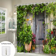 the shower curtain is decorated with plants and potted flowers in front of a wooden door