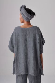 "🚚..ALL ORDERS ARE SHIPPED VIA DHL EXPRESS MAIL Basic, loose caftan top with round neck line and generous caftan sleeves. Excellent basic piece that looks good on almost any shape. A must have! * Pull-on style * Crew neck * Dropped shoulder * Caftan sleeves * Side slits * Prewashed, Preshrunk Measurements approximately: Sleeve Length (from side of neckline): 13\" (33 cm) Armhole: 26\" (66 cm) round Bust: 60\" (152.5 cm- all around ) Hips: 60\" (152.5 cm- all around ) Approx. kaftan length from Kaftan Tops, Bluish Gray, Loose Fitting Tops, Women Tunic Tops, Long Sleeve Tunic, Dhl Express, Short Sleeves Tops, Camisole Top, Blouses For Women