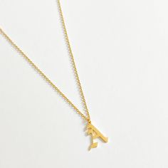 This is one of our best sellers ﻿If you are a lover of the old english style font then you have come to the right place. This initial necklace is one of our best sellers and for good reason. Made from waterproof and tarnish free materials. You can wear this necklace in style every day without a worry. Classic Gold Monogram Charm Necklace, Classic Gold Charm Necklace With Monogram, Classic Gold Charm Necklaces With Initials, Tarnish-resistant Classic Initial Pendant Name Necklace, Classic Tarnish-resistant Initial Pendant Necklace, Tarnish-resistant Classic Initial Pendant Necklace, Classic Tan Initial Necklace For Gift, Classic Personalized Tan Initial Necklace, Classic Tan Personalized Initial Necklace