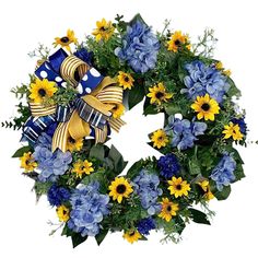 a blue and yellow wreath with sunflowers, daisies, and other flowers