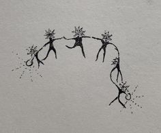 some black ink on white paper with scissors in the shape of two branches and flowers