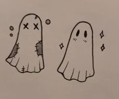 two cartoon ghost faces are drawn in black and white, one has an x on it's face