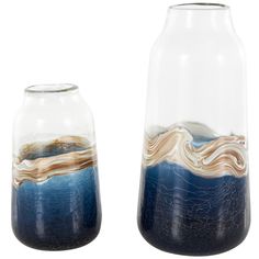 two vases with blue and white designs on the bottom, one is filled with water