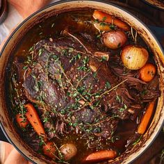 pot roast with carrots, potatoes and herbs