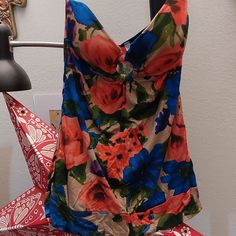 Super Pretty And Cute Strapless Floral Top. Lightly Padded Cups For Support With A Keyhole Opening. Tan Background With Bright Coral And Blue Flowers. Brand New Never Worn Casual Multicolor Tops With Built-in Bra, Casual Multicolor Top With Built-in Bra, Multicolor Beach Tops With Built-in Bra, Multicolor Vacation Tops With Built-in Bra, Summer Multicolor Tops With Built-in Bra, Spring Poolside Tank Top With Built-in Bra, Multicolor Stretch Beachwear Tops, Stretch Floral Print Top For Beach Season, Stretch Floral Print Beachwear Top