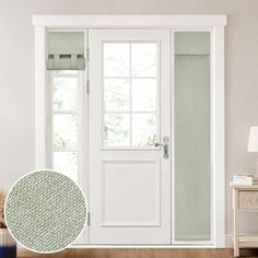 a room with a white door and green curtains