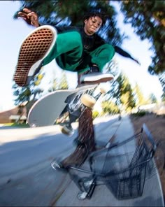 a man riding a skateboard up the side of a ramp