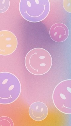 an image of smiley faces on a multicolored background that looks like something out of nowhere