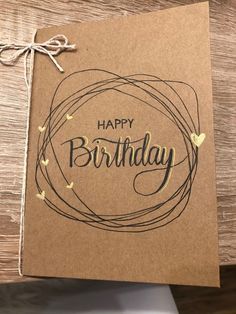 a brown card with the words happy birthday on it