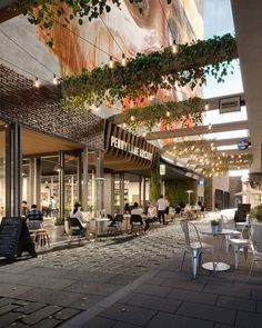 an artist's rendering of the interior of a restaurant with outdoor seating and tables