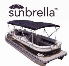 the sunbrella boat is parked on the water