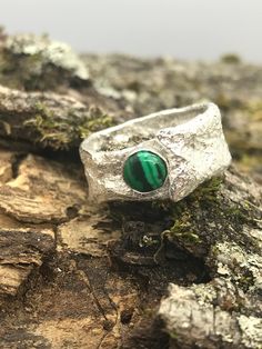 This hand-created reticulated sterling silver (.925) wide band ring features a beautiful round natural malachite gemstone. This ring is a size 6.5.  Malachite absorbs negative energies and pollutants. It clears and activates the chakras and attunes to spiritual guidance. It opens the heart to unconditional love. All my creations have been designed and handmade with collected and imported materials from all over the world. My metals and gemstone beads have been carefully selected for the best pre Malachite Ring, Mount Airy, Malachite Rings, Wide Band Ring, Good Presentation, Wide Band Rings, Spiritual Guidance, Wide Bands, Unconditional Love