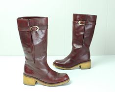 Vintage 70's Etienne Aigner burgundy leather boots. Knee high. Slightly rounded square toes. Buckle at the calf. Textured rubber sole. Condition: Very good condition. Only light wear. Brand: Etienne Aigner Material: Leather upper, rubber sole Size: 5 1/2 Length inside from heel to toe: 8 3/4 in. Heel width inside: 2 1/4 in. Ball outside: 2 7/8 in. Boot height: 11 1/2 in. Calf circumference: 12 1/2 in. Leather Boots Knee High, Boots Knee High, Womens Riding Boots, Rounded Square, Tall Leather Boots, Floral Peplum, Etienne Aigner, Vintage Boots, Boots Knee