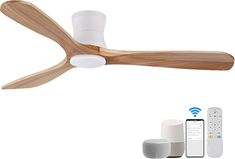 a wooden ceiling fan with remote controls and an appliance on the wall next to it