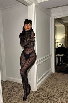 Kylie Jenner attended the Thierry Mugler exhibition opening in New York City wearing a sheer catsuit and a vintage cloak. #Lifestyle Kylie Jenner Thierry Mugler, Mesh Dress Photoshoot, Sheer Lace Outfit, Sheer Catsuit Outfit, Black Rhinestone Outfit, Lingerie Party Outfit Ideas, Sheer Clothes Outfit, Lace Catsuit Outfit