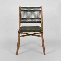 a wooden chair with woven seat padding