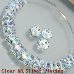 NEW Crystal 100/pcs  AB clear silver toned & Crystal Crafts Czech spacer Rhinestone Loose beads Rondelle Quantity:  100/Pcs Size:         7x3.2mm 1.2mm Holes Materials:    Bright silver plated ...（lead free） Pictures are of what you will be getting...  I do offer combined shipping discounts just change the quantity at check out and it will automatically recalculate the extra shipping Crystal Crafts, Making Beads, Czech Crystal, Crystal Ab, Bead Caps, How To Make Earrings, Bohemian Jewelry, Jewelry Making Beads, Spacer Beads