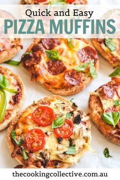 several small pizzas with toppings on top of white paper and green leafy garnish