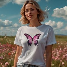 Transform your wardrobe with our stunning Pink Butterfly T-Shirt! This stylish and comfortable tee features a vibrant, oversized pink butterfly graphic that adds a touch of whimsy and elegance to any outfit. Crafted from high-quality, breathable cotton, this shirt ensures all-day comfort and durability. Perfect for casual outings, relaxed weekends, or as a unique statement piece, this t-shirt pairs effortlessly with jeans, shorts, or skirts. Embrace the beauty of nature and let your style soar with our Pink Butterfly T-Shirt. Available in adult, kids, and toddler sizes, the Pink Butterfly t-shirt is perfect for creating adorable Mommy and Me matching outfits that everyone will love! This listing is for the adult unisex size. To purchase the kids and toddler sizes, please click the links be Butterfly Kids, Butterfly Graphic, Mama Shirts, Pink Butterfly, Matching Outfits, Mommy And Me, Mom Shirts, Heavy Cotton, Beautiful Nature