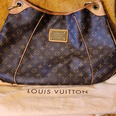 Louis Vuitton Brown And Tan Large Shoulder Bag, Clean Tan Cloth Interior, Slightly Worn Shoulder Strap, Gold Hardware, Protective Legs. Protective Bag Included. Louis Vuitton Vintage, Bags Louis Vuitton, Vintage Monogram, Louis Vuitton Brown, Large Shoulder Bags, Vintage Louis Vuitton, Louis Vuitton Bags, Louis Vuitton Bag, Gold Hardware