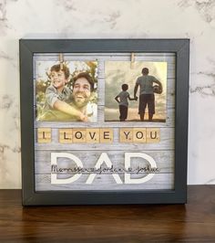 a father's day photo frame with the words i love you, dad and two photos