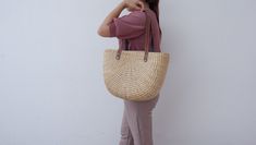 Bridesmaid Tote, Straw tote, Handwoven Tote Bag, Tote Bag with Leather Handles, Wovenbag, Bridesmaid Gifts, Beach tote bag, Straw basket Summer bag To create an unique tote bag thats both aesthetic as well as practical. Vintage style tote looking bag in genuine leather, made in Thailand All of our market baskets may vary slightly in size and style as they are hand woven in Thailand made from waterhyacinth straw These bags would make terrific gifts, too! (start thinking about gifts for Mother's D Elegant Straw Bucket Bag For Everyday Use, Elegant Everyday Straw Bucket Bag, Elegant Basket Shoulder Bag For Everyday, Elegant Basket Beach Bag For Everyday Use, Elegant Everyday Basket Bag, Elegant Basket Shoulder Bag For Daily Use, Elegant Handmade Basket Bag, Everyday Handmade Straw Bucket Bag, Everyday Handmade Bucket Straw Bag