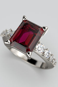 Italian Gold engagement ring with natural Rhodolite garnet emerald cut and natural Diamonds, made in Italy in 14k or 18k gold by Oltremare Gioielli. Italian Engagement Ring, Italian Engagement, Garnet And Diamond Ring, Riding Clothes, Rhodolite Garnet, Diamonds And Gold, Gold Engagement Ring, Gold Engagement Rings, Gold Engagement