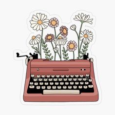 an old - fashioned typewriter with daisies on the top and flowers in the bottom