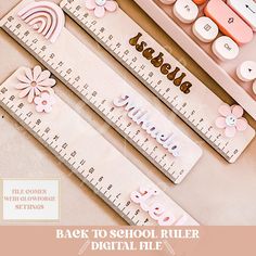 the back to school ruler is shown with flowers on it