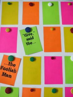 a bulletin board with different colored papers and polka dots on it that say give and the foolish man