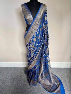 Item...Banarasi Saree Fabric...Khaddi Georgette Work....Jari weaving work Length...Saree 5.5 mtr Bp...1 mtr Care...Dry wash Blue Georgette Dupatta With Zari Weaving, Traditional Georgette Wear With Meenakari Drape, Traditional Handloom Georgette Saree, Georgette Traditional Wear With Meenakari, Traditional Meenakari Georgette Wear, Handloom Georgette Saree For Festivals, Bollywood Style Handloom Georgette Saree, Bollywood Style Handloom Georgette Dupatta, Handloom Georgette Dupatta With Traditional Drape