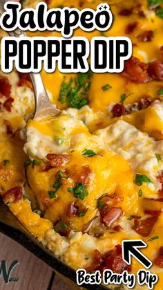 a casserole dish with cheese and bacon on it, topped with a spoon