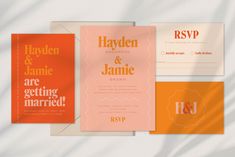 wedding stationery with orange and pink colors