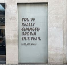 an advertisement on the side of a building that says you've really changed grown this year