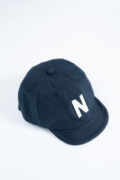 These are quite the staple accessory at the shop now. From the short brim to the fact that they're lightweight and breathable, they were an instant yes. They have a classic baseball brim style, but nothing about these is classic. They are using modern techniques to weave the fabric from which this style is born. This is their iconic "Back Nep" fabric which has a ton of fleck and character. You can now wear back nep from head to toe. 100% Cotton Leather Closure Produced in Jackman factory in Fukui prefecture table { border-collapse: collapse; width: 100%; } th, td { border: 1px solid black; padding: 8px; text-align: center; } Size Around the Head One Size 22.44-26.38" A variance of +/-.5" is within tolerance. Fit Notes: These have a one-size notation, but they probably wouldn't be the best Classic Curved Brim Baseball Cap For Sports, Classic Baseball Cap For Streetwear During Baseball Season, Classic Hats For Baseball Season Streetwear, Classic Six-panel Fitted Hat For Streetwear, Classic Six-panel Snapback Hat, Classic One Size Fits Most Baseball Cap, Classic Snapback Hat With Curved Brim, Classic Six-panel Trucker Hat, Classic Navy Adjustable Baseball Cap