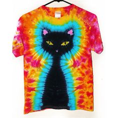 a tie - dyed t - shirt with a black cat's face on it