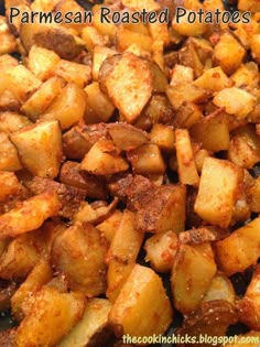 some cooked potatoes are sitting on top of a grilling pan with the words parmesan roasted potatoes above it