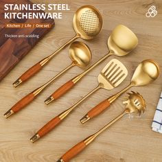 stainless steel kitchen utensils with wooden handles and spoons on a wood table